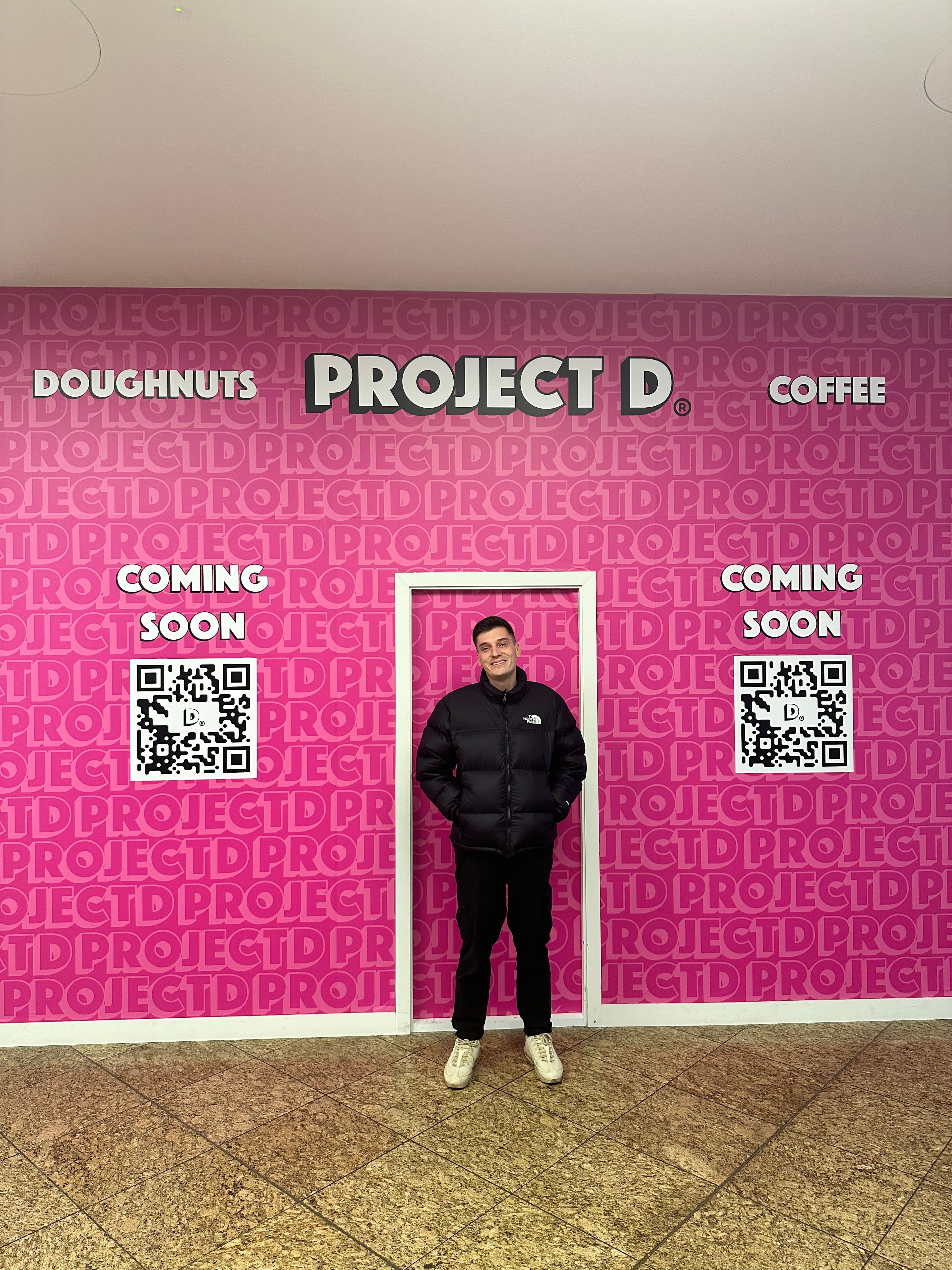 Max Poynton at a Project D shop front